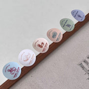Custom round coated paper labels with printed fruit illustrations